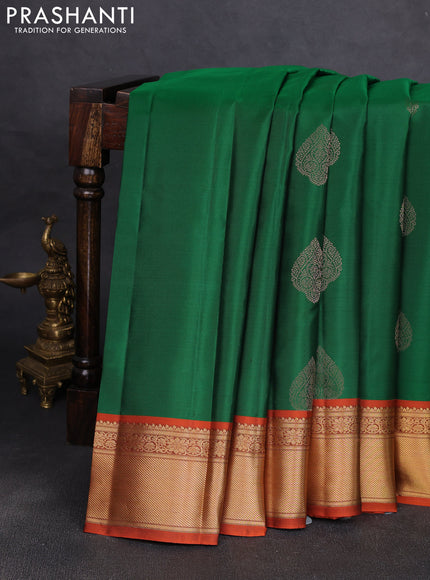 Pure kanchipuram silk saree green and orange with allover zari woven buttas and rich zari woven korvai border