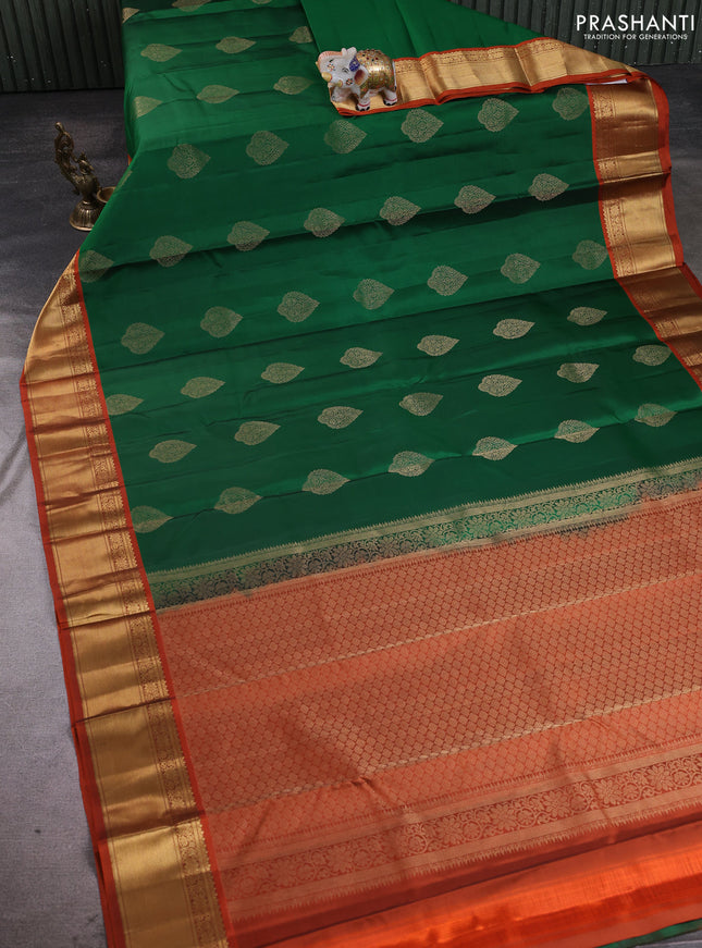 Pure kanchipuram silk saree green and orange with allover zari woven buttas and rich zari woven korvai border