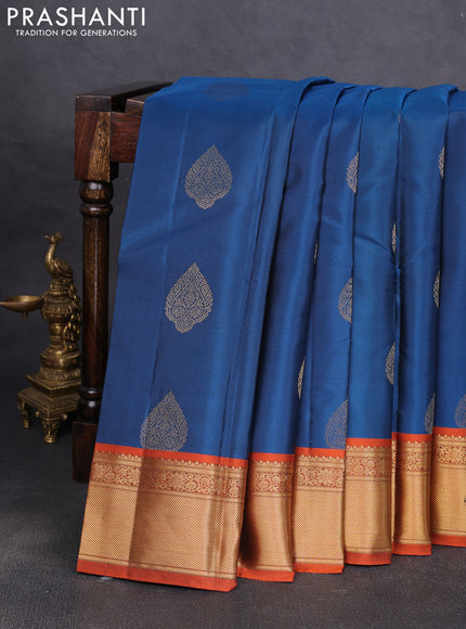 Pure kanchipuram silk saree peacock blue and orange with allover zari woven buttas and rich zari woven korvai border