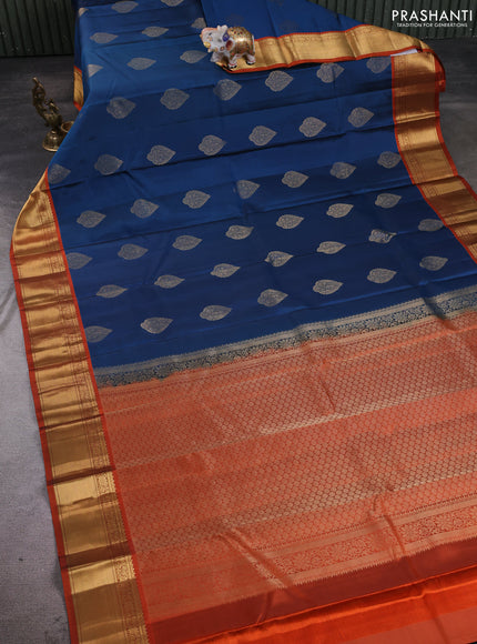 Pure kanchipuram silk saree peacock blue and orange with allover zari woven buttas and rich zari woven korvai border