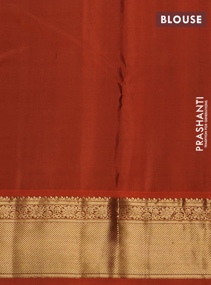 Pure kanchipuram silk saree peacock blue and orange with allover zari woven buttas and rich zari woven korvai border