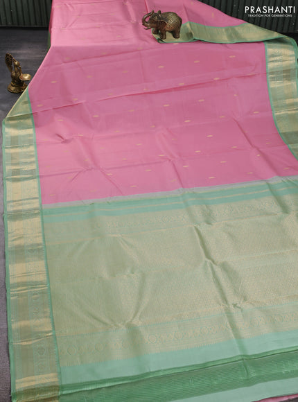 Pure kanchipuram silk saree pastel pink and pastel green with zari woven buttas and temple design zari woven korvai border