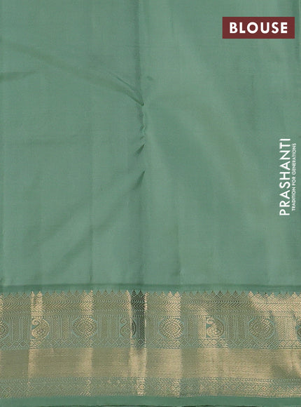Pure kanchipuram silk saree jamun shade and pastel green with zari woven buttas and temple design zari woven korvai border