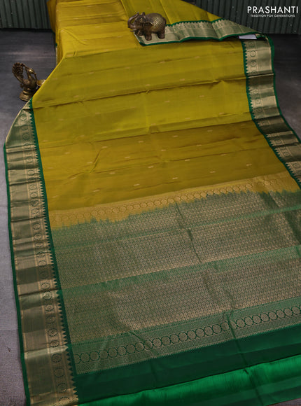 Pure kanchipuram silk saree mustard green and green with zari woven buttas and temple design zari woven korvai border