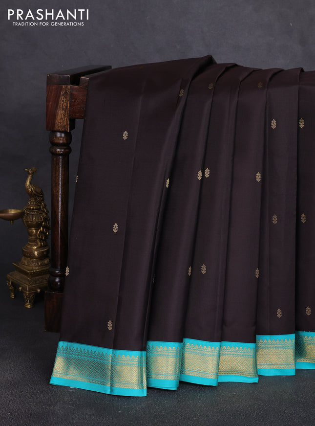 Pure kanchipuram silk saree coffee brown and teal blue with allover zari woven butttas and zari woven korvai border