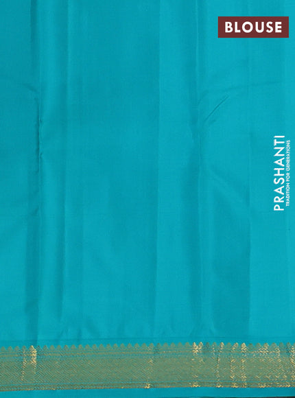 Pure kanchipuram silk saree coffee brown and teal blue with allover zari woven butttas and zari woven korvai border