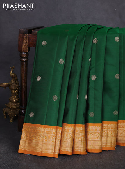 Pure kanchipuram silk saree green and dark mustard with zari woven buttas and zari woven korvai border