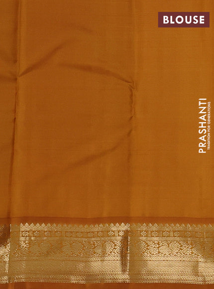 Pure kanchipuram silk saree green and dark mustard with zari woven buttas and zari woven korvai border