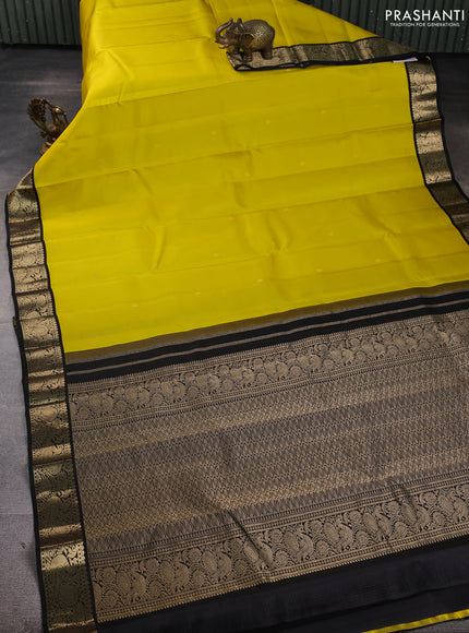 Pure kanchipuram silk saree lime yellow and black with zari woven buttas and zari woven korvai border