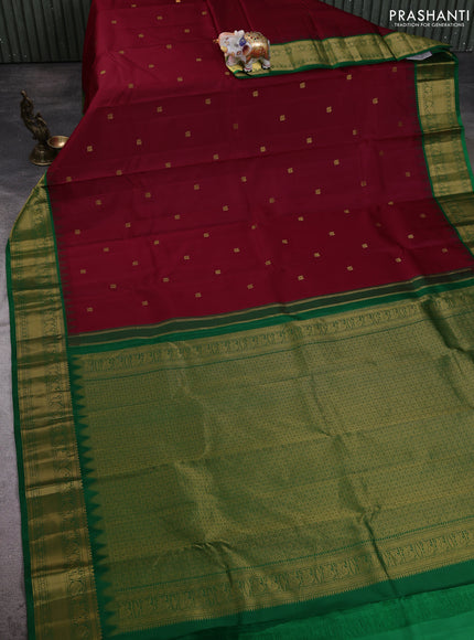 Pure kanchipuram silk saree maroon and green with annam zari woven buttas and temple design zari woven border