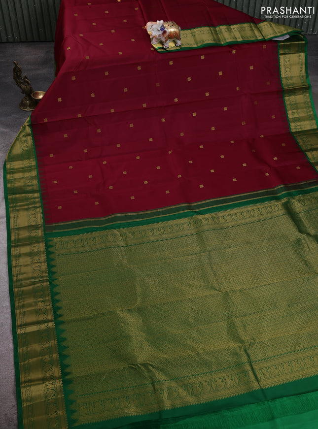 Pure kanchipuram silk saree maroon and green with annam zari woven buttas and temple design zari woven border