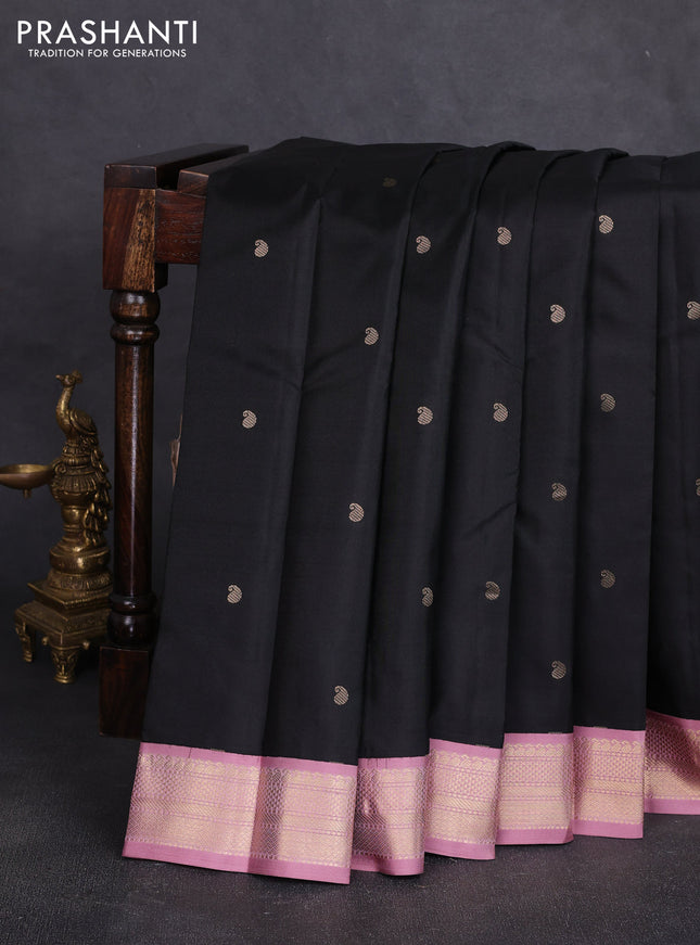 Pure kanchipuram silk saree black and mauve pink with allover paisely zari woven buttas and zari woven korvai border