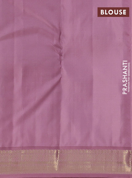 Pure kanchipuram silk saree black and mauve pink with allover paisely zari woven buttas and zari woven korvai border