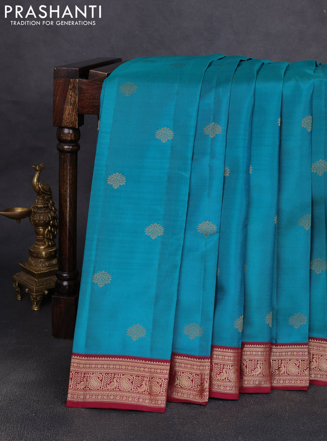 Pure kanchipuram silk saree teal green and deep maroon with zari woven buttas and zari woven korvai border