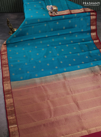 Pure kanchipuram silk saree teal green and deep maroon with zari woven buttas and zari woven korvai border