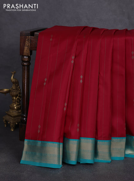 Pure kanchipuram silk saree red and teal blue with allover zari stripe pattern & buttas and zari woven korvai border
