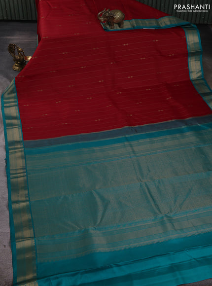 Pure kanchipuram silk saree red and teal blue with allover zari stripe pattern & buttas and zari woven korvai border