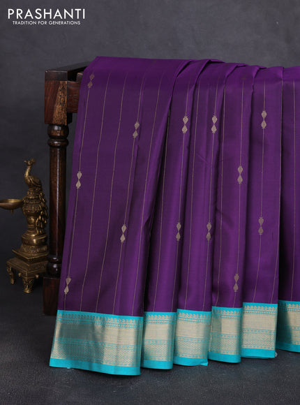 Pure kanchipuram silk saree violet and teal blue with allover zari stripe pattern & buttas and zari woven korvai border