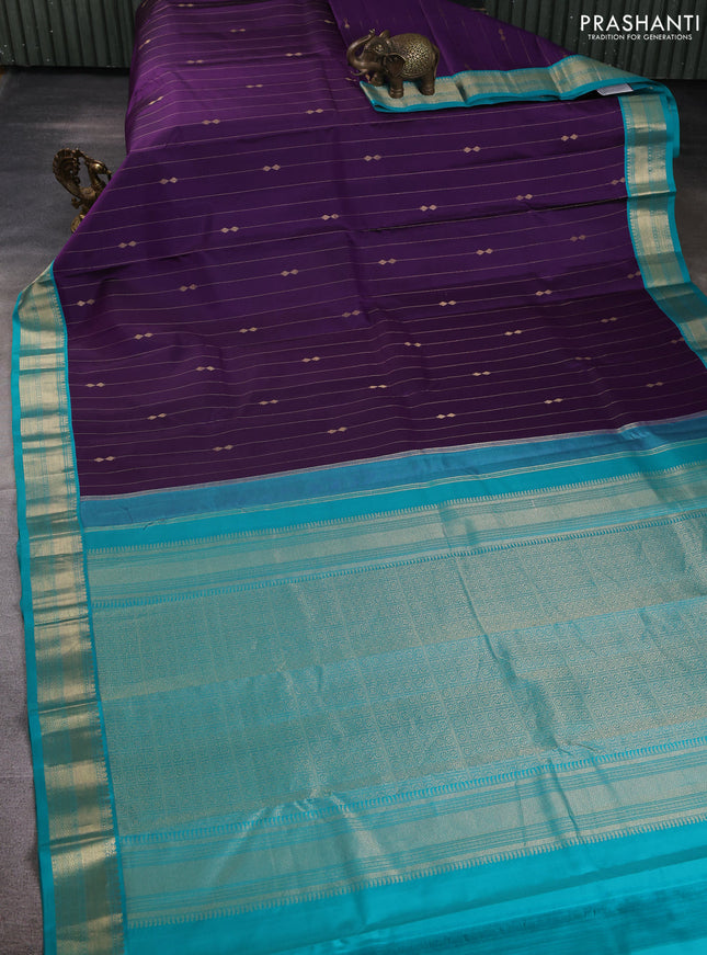 Pure kanchipuram silk saree violet and teal blue with allover zari stripe pattern & buttas and zari woven korvai border