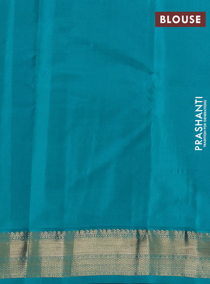 Pure kanchipuram silk saree violet and teal blue with allover zari stripe pattern & buttas and zari woven korvai border
