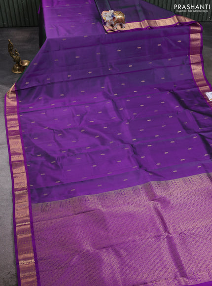 Pure kanchipuram silk saree dual shade of purple and violet with allover zari woven buttas and zari woven korvai border