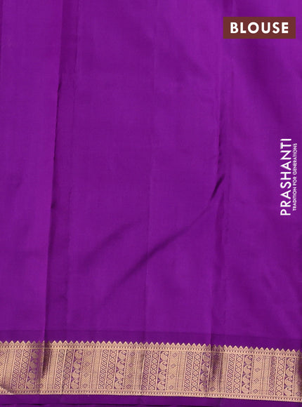 Pure kanchipuram silk saree dual shade of purple and violet with allover zari woven buttas and zari woven korvai border