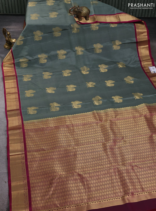 Pure kanchipuram silk saree gryish green and magenta pink with annam zari woven buttas and zari woven korvai border