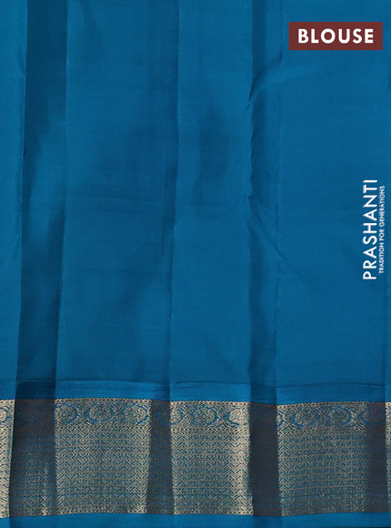 Pure kanchipuram silk saree rustic orange and cs blue with annam zari woven buttas and zari woven korvai border