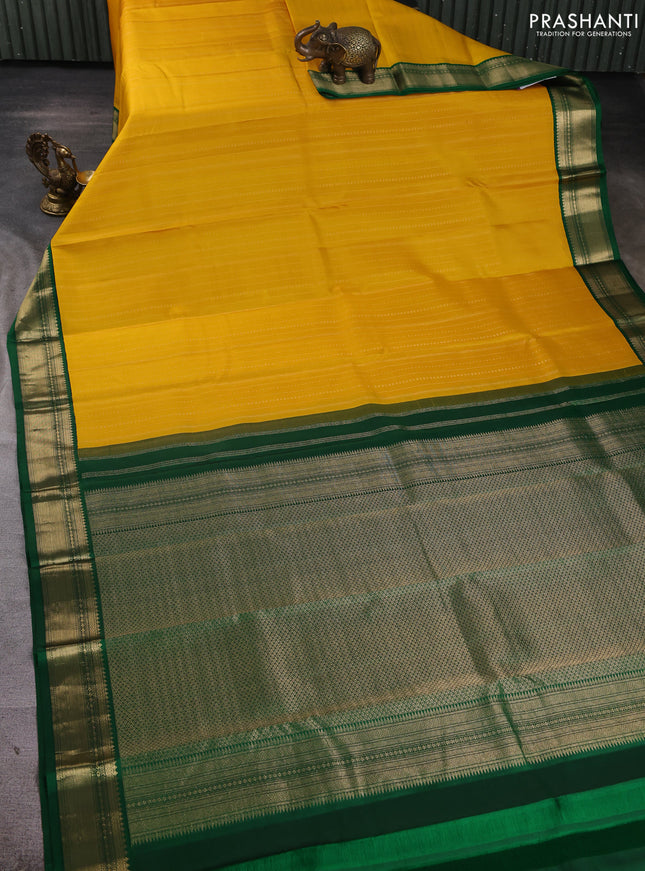Pure kanchipuram silk saree yellow and green with allover zari stripe pattern & buttas and zari woven korvai border