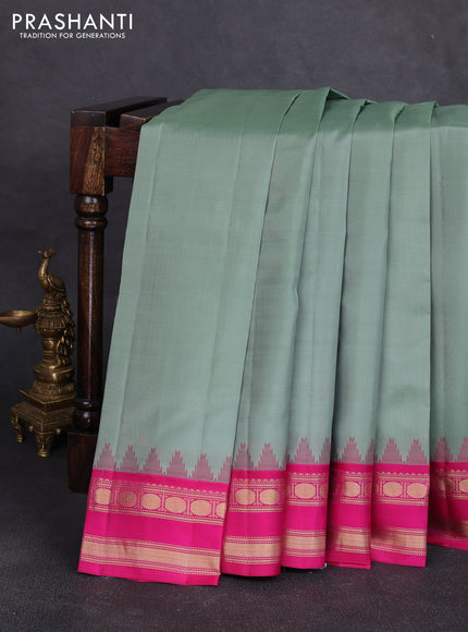 Pure kanchipuram silk saree pastel green and pink with plain body and temple design zari woven korvai border