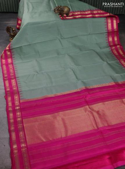 Pure kanchipuram silk saree pastel green and pink with plain body and temple design zari woven korvai border