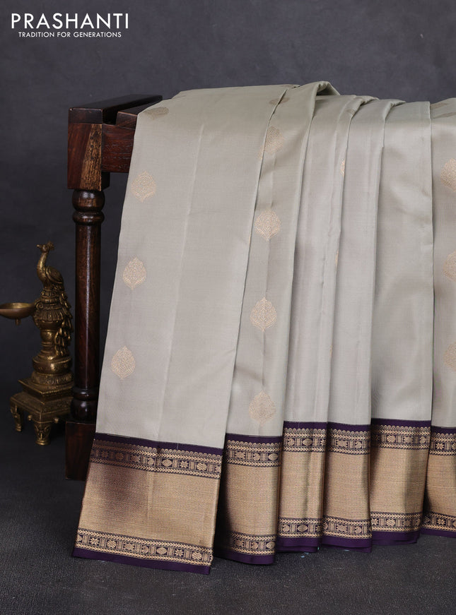 Pure kanchipuram silk saree pastel green and deep jamun with zari woven buttas and zari woven korvai border