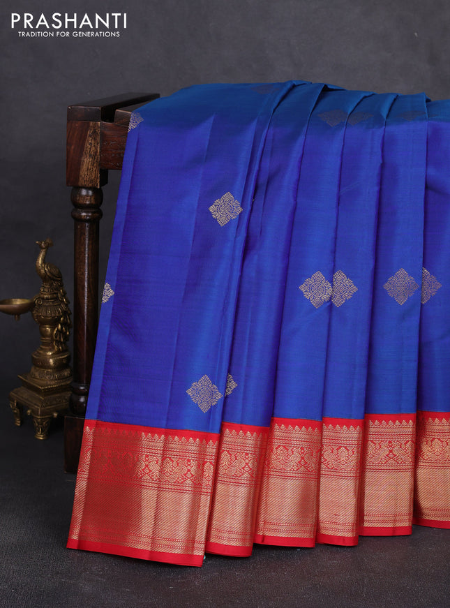 Pure kanchipuram silk saree dual shade of bluish green and red with zari woven buttas and zari woven korvai border