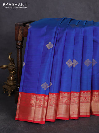 Pure kanchipuram silk saree dual shade of bluish green and red with zari woven buttas and zari woven korvai border