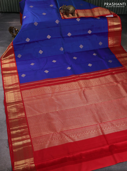 Pure kanchipuram silk saree dual shade of bluish green and red with zari woven buttas and zari woven korvai border