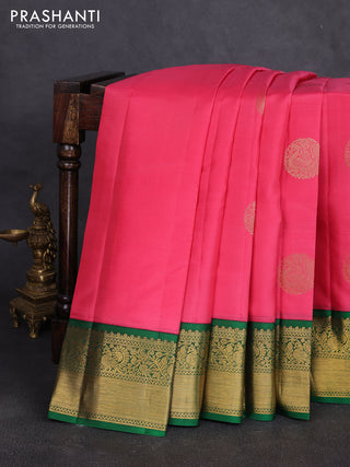 Pure kanchipuram silk saree peach pink and green with rudraksha zari woven buttas and zari woven korvai border