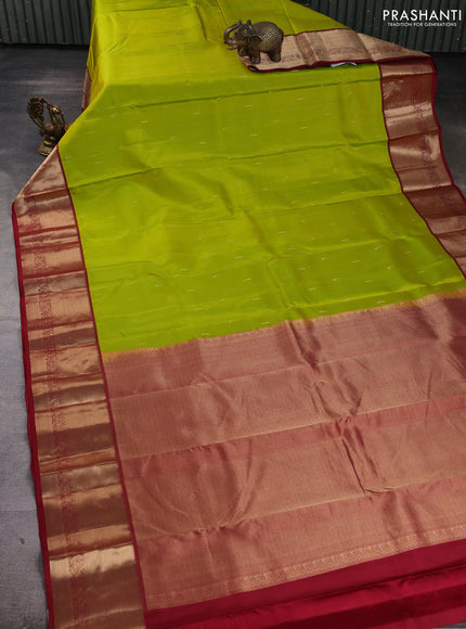 Pure kanchipuram silk saree lime green and maroon with allover zari weaves & muniya buttas and rich zari woven korvai border