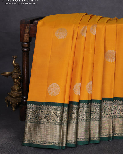 Pure kanchipuram silk saree mustard yellow and bottle green with rudraksha zari woven buttas and zari woven korvai border