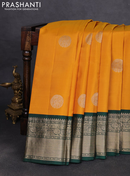 Pure kanchipuram silk saree mustard yellow and bottle green with rudraksha zari woven buttas and zari woven korvai border