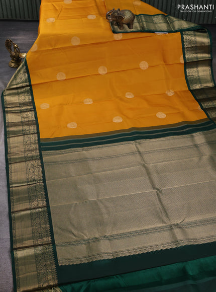 Pure kanchipuram silk saree mustard yellow and bottle green with rudraksha zari woven buttas and zari woven korvai border