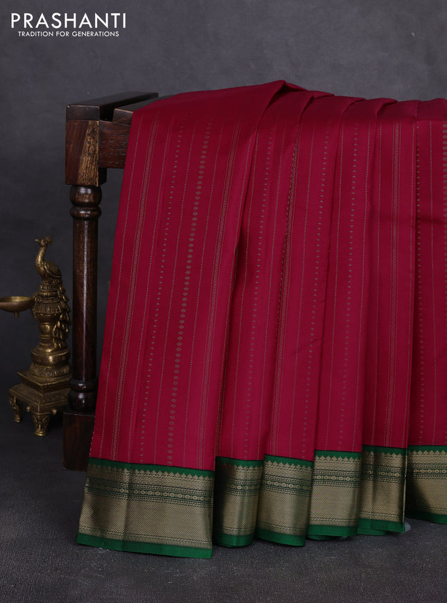 Pure kanchipuram silk saree tomato pink and green with allover zari stripe pattern & buttas and zari woven korvai border