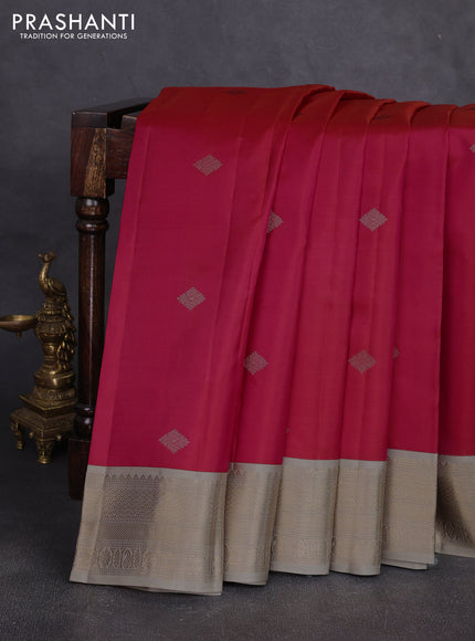 Pure kanchipuram silk saree dual shade of pinkish orange and beige with zari woven buttas and zari woven korvai border