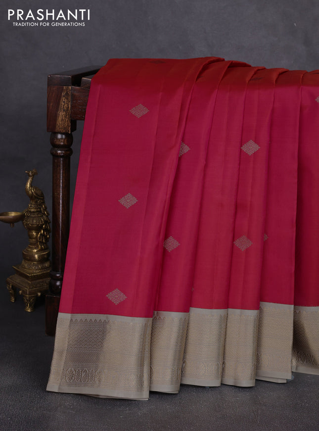 Pure kanchipuram silk saree dual shade of pinkish orange and beige with zari woven buttas and zari woven korvai border