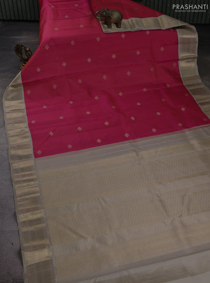 Pure kanchipuram silk saree dual shade of pinkish orange and beige with zari woven buttas and zari woven korvai border
