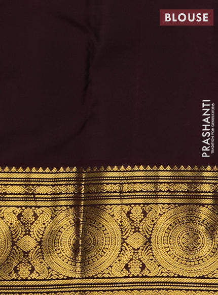 Pure kanchipuram silk saree yellow and coffee brown with zari woven buttas and long zari woven korvai border