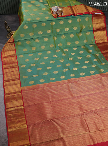Pure kanchipuram silk saree dual shade of greenish yellow and red with allover zari woven buttas and zari woven korvai border