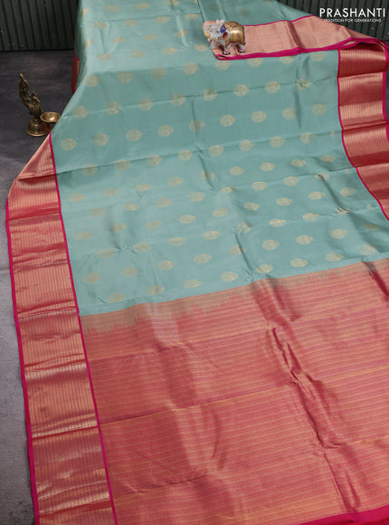 Pure kanchipuram silk saree pastel green and pink with allover zari woven buttas and zari woven korvai border