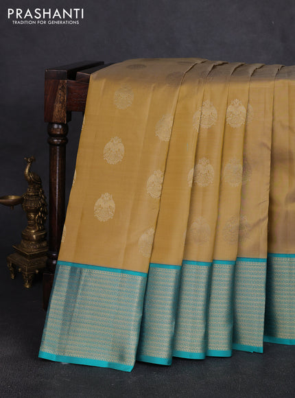 Pure kanchipuram silk saree dak beige and teal blue with allover zari woven buttas and zari woven korvai border
