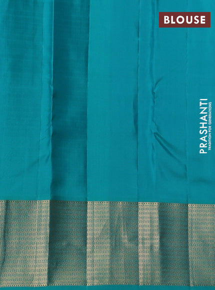 Pure kanchipuram silk saree dak beige and teal blue with allover zari woven buttas and zari woven korvai border