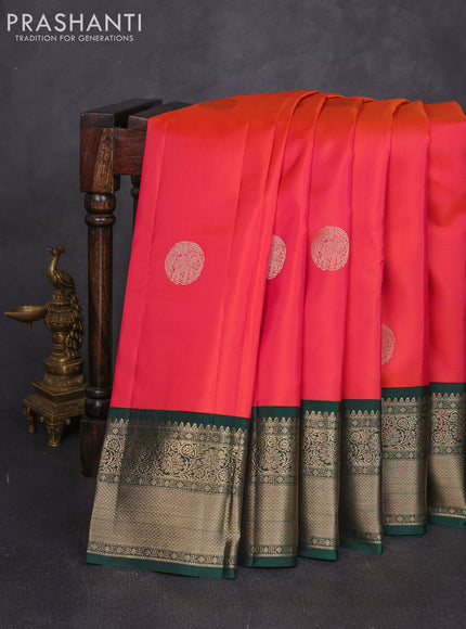 Pure kanchipuram silk saree dual shade of pinkish orange and green with rudraksha zari woven buttas and long zari woven korvai border